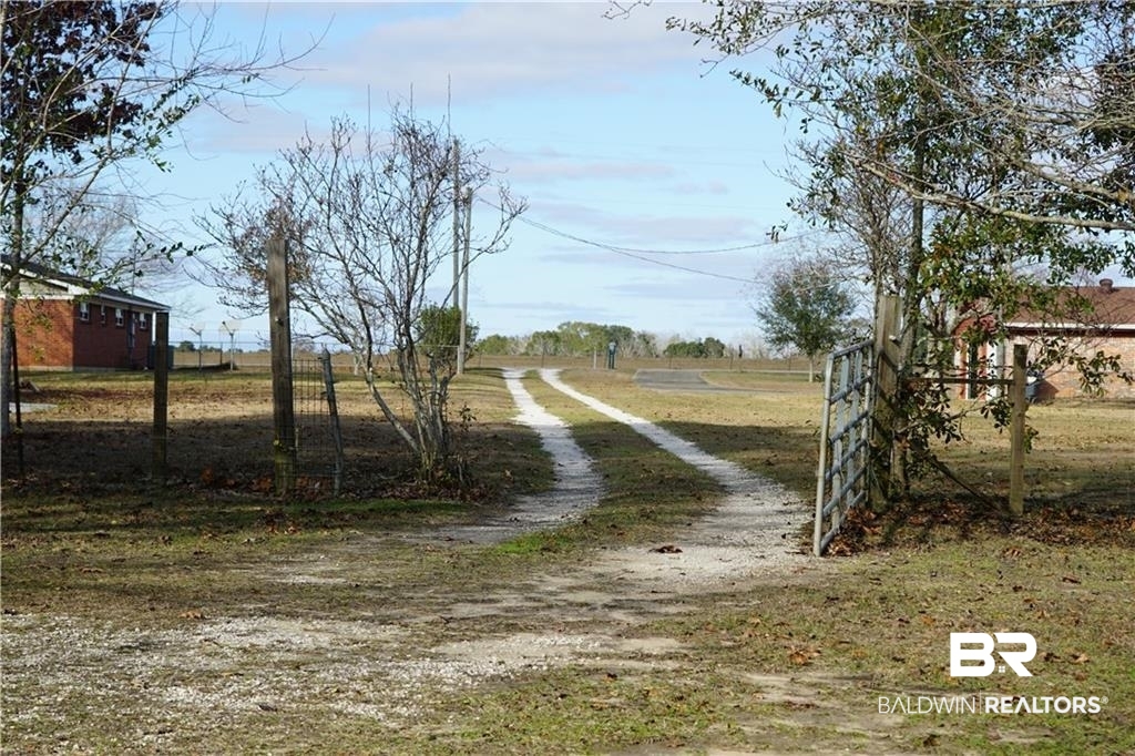 13301 A Hugh Fort Road Grand Bay, AL 36541 - Photo 31 of 34 View of road with a rural view