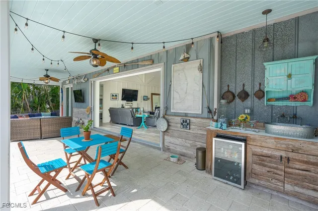 a view of a living room and kitchen
