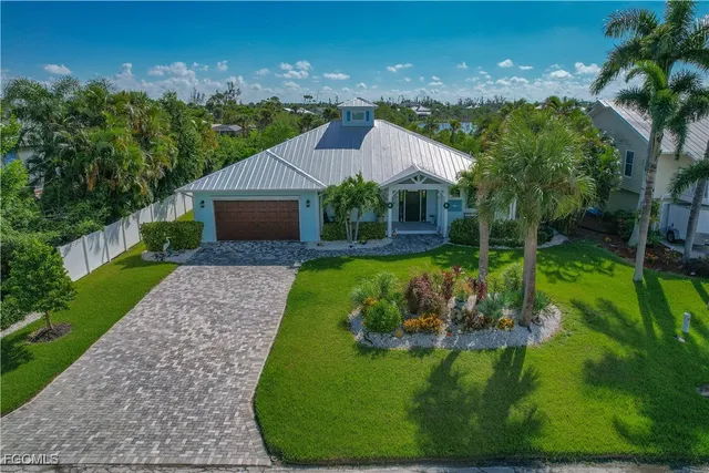 a view of a house with big yard