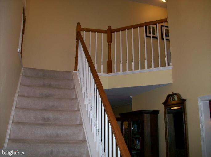 1515 Rochester Court Crofton, MD 21114 - Photo 5 of 26 View from Foyer Up to Bedroom Level