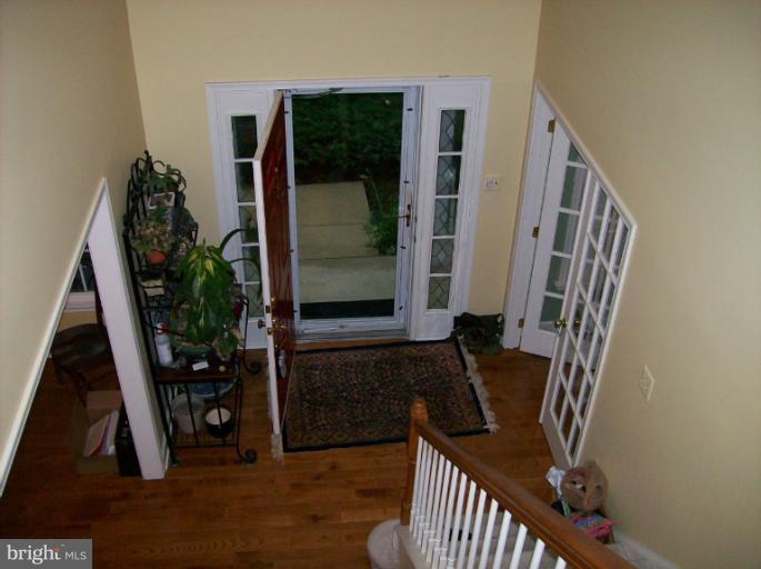1515 Rochester Court Crofton, MD 21114 - Photo 10 of 26 View Down to Foyer from Upper Staircase