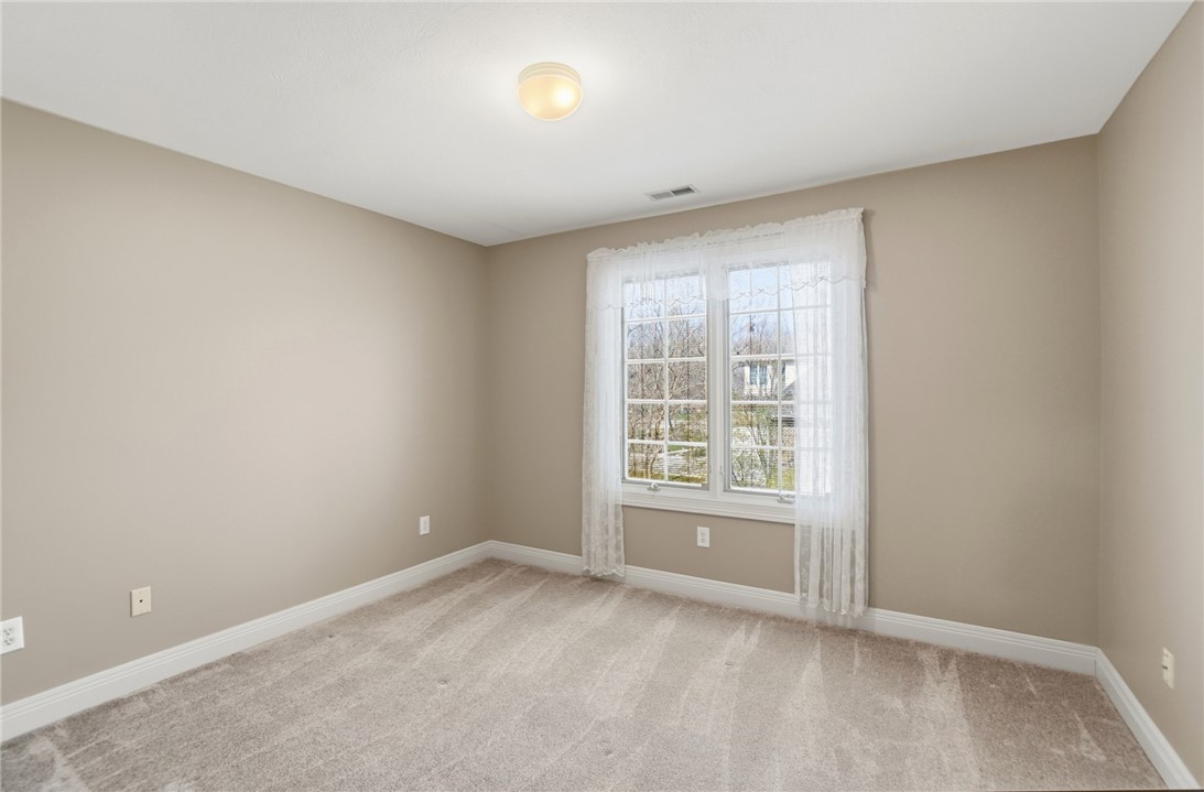 472 Timber Walk Court Springboro, OH 45066 - Photo 31 of 86 Bedroom 4 on the second level features a large window, offering ample natural light and a pleasant view.