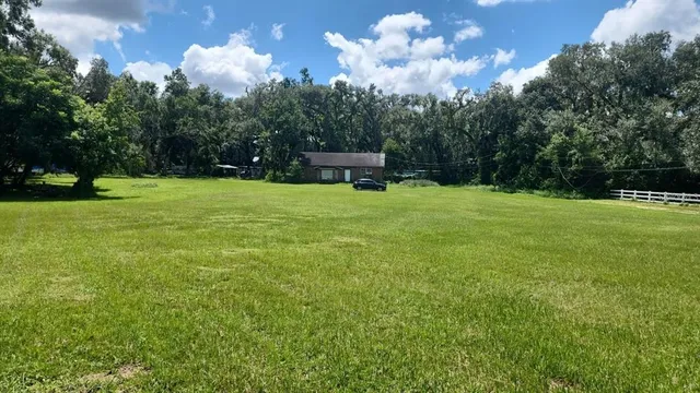 a fire hydrant in the middle of a field