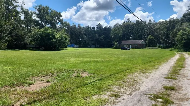 a fire hydrant in the middle of a field