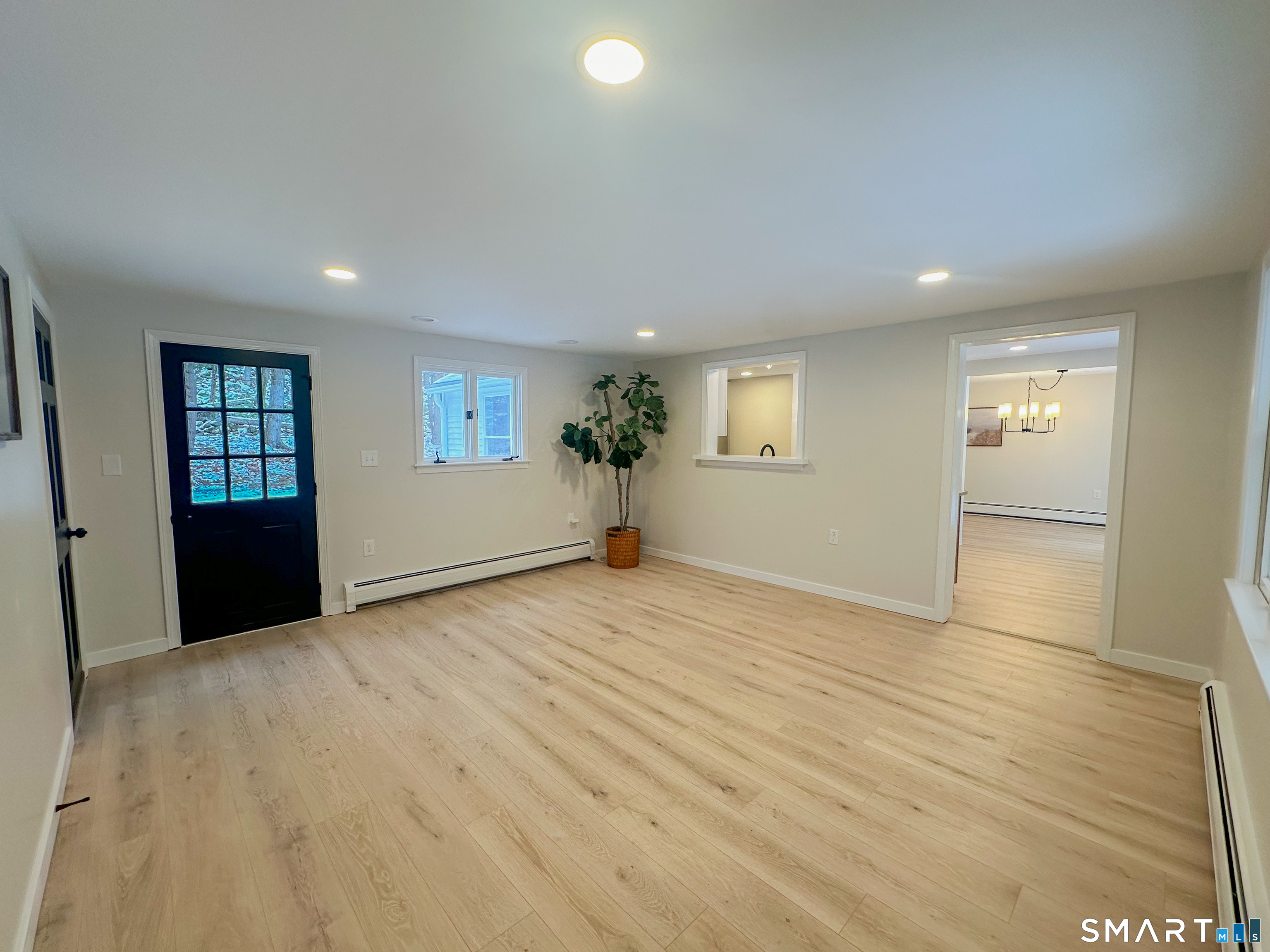 92 Rose Haven Road Somers, CT 06071 - Photo 10 of 17 a view of empty room with wooden floor