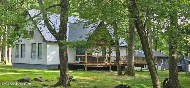 a view of a house with a swimming pool