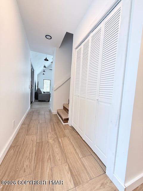 128 Gabrielle Lane Dingmans Ferry, PA 18328 - Photo 18 of 56 a view of a hallway with wooden floor and staircase