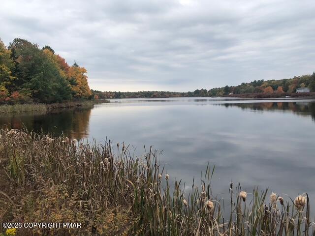128 Gabrielle Lane Dingmans Ferry, PA 18328 - Photo 56 of 56 a view of a lake with a city