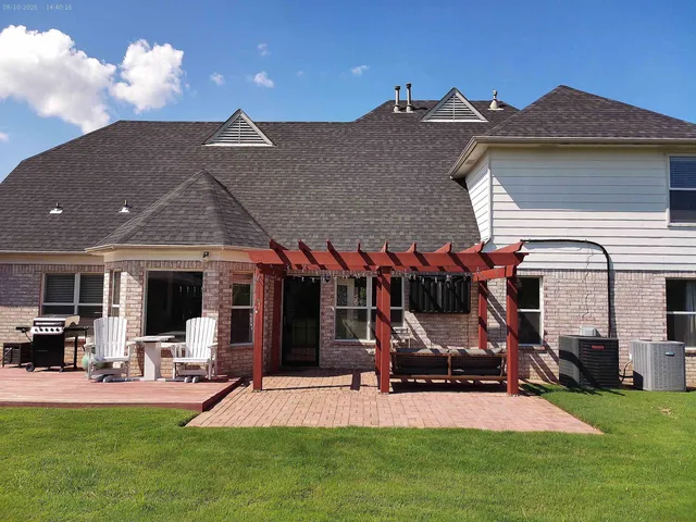 a view of a house with sitting area