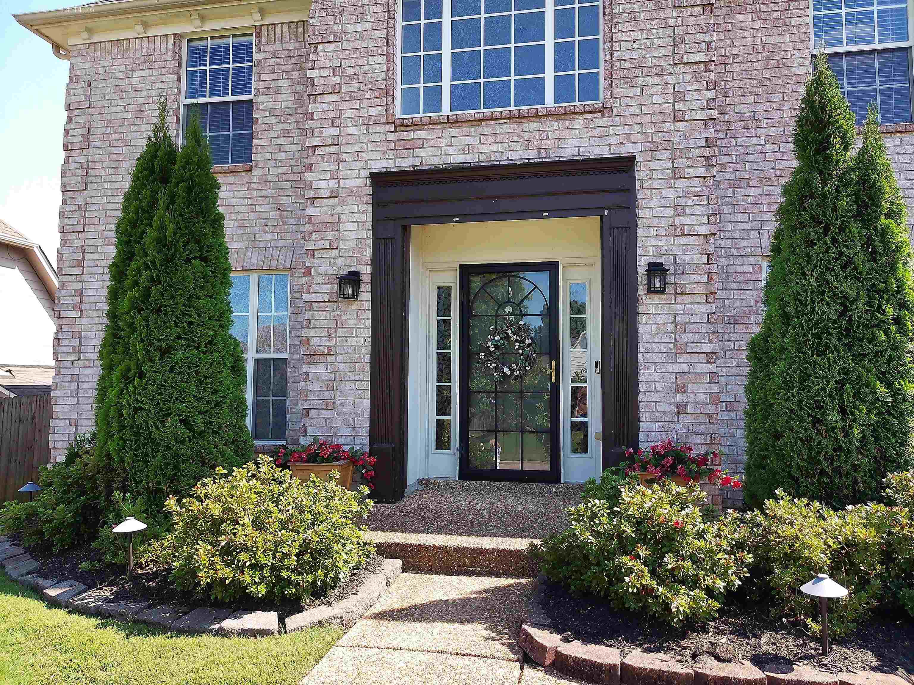25 Whispering Ridge Cove Oakland, TN 38060 - Photo 2 of 19 Property entrance with brick siding