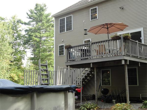 59 Nash Road Ashby, MA 01431 - Photo 2 of 15 a view of a house with a balcony