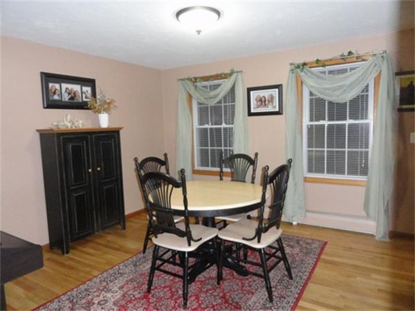 59 Nash Road Ashby, MA 01431 - Photo 8 of 15 a view of a dining room with furniture and wooden floor