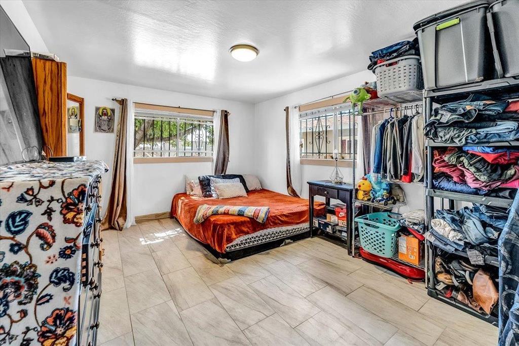 112 Serrano Place Soledad, CA 93960 - Photo 18 of 19 a bedroom with a bed and a window