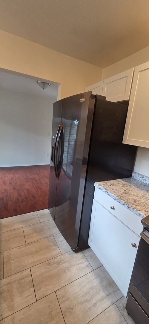 2001 South Mattis Avenue, Unit E Champaign, IL 61821 - Photo 4 of 11 a view of washer and dryer