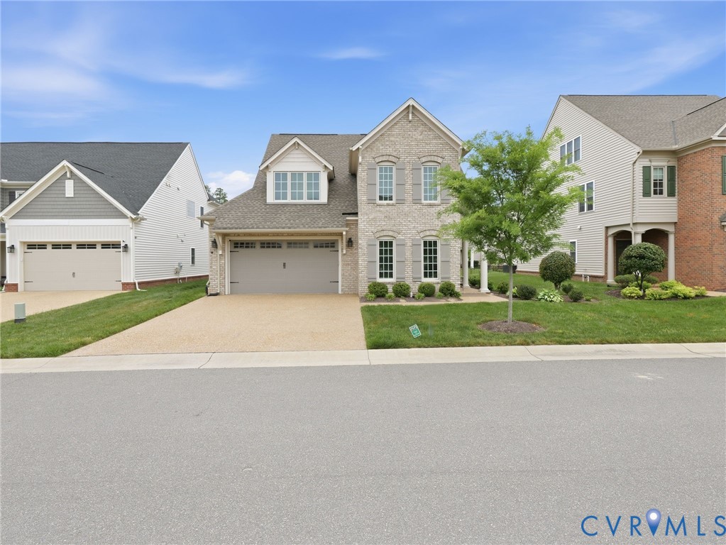 12520 Donahue Road Glen Allen, VA 23059 - Photo 1 of 35 a view of house with yard and garage