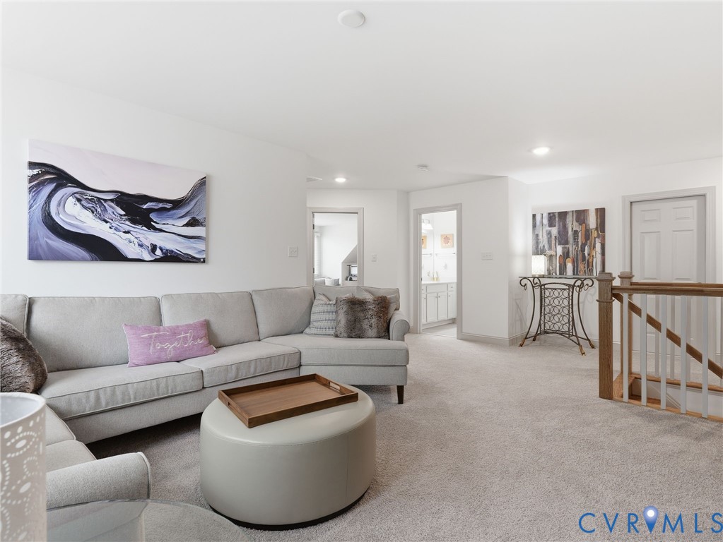 12520 Donahue Road Glen Allen, VA 23059 - Photo 25 of 35 a living room with furniture and a ceiling fan