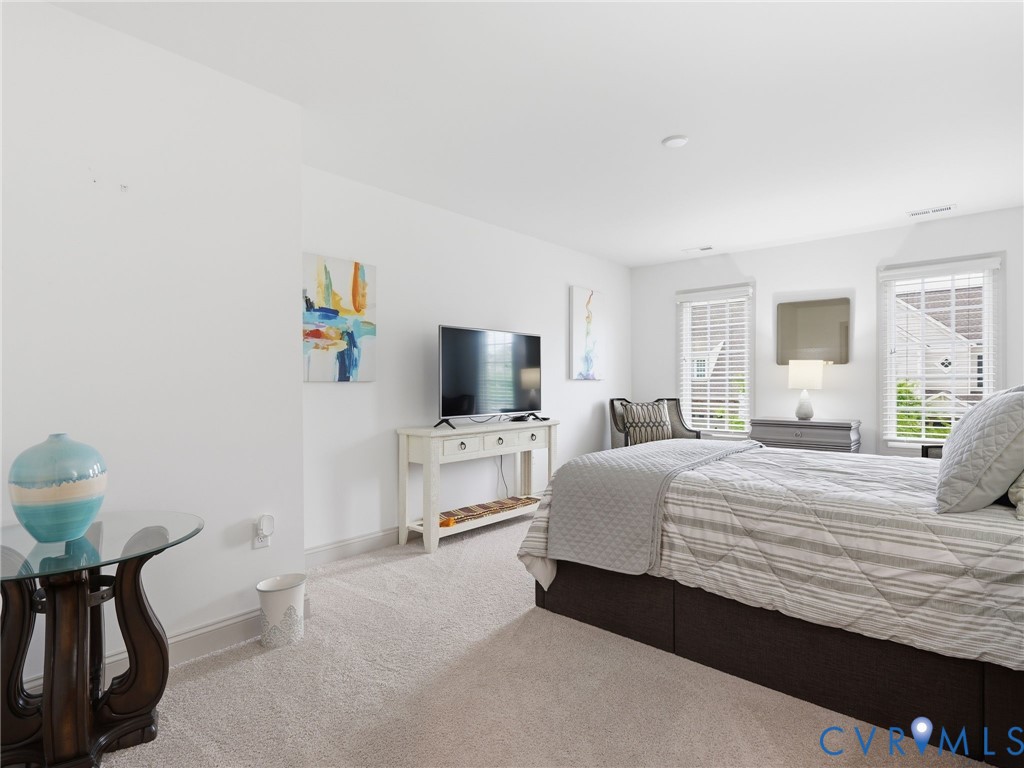 12520 Donahue Road Glen Allen, VA 23059 - Photo 26 of 35 a bedroom with a bed and a television
