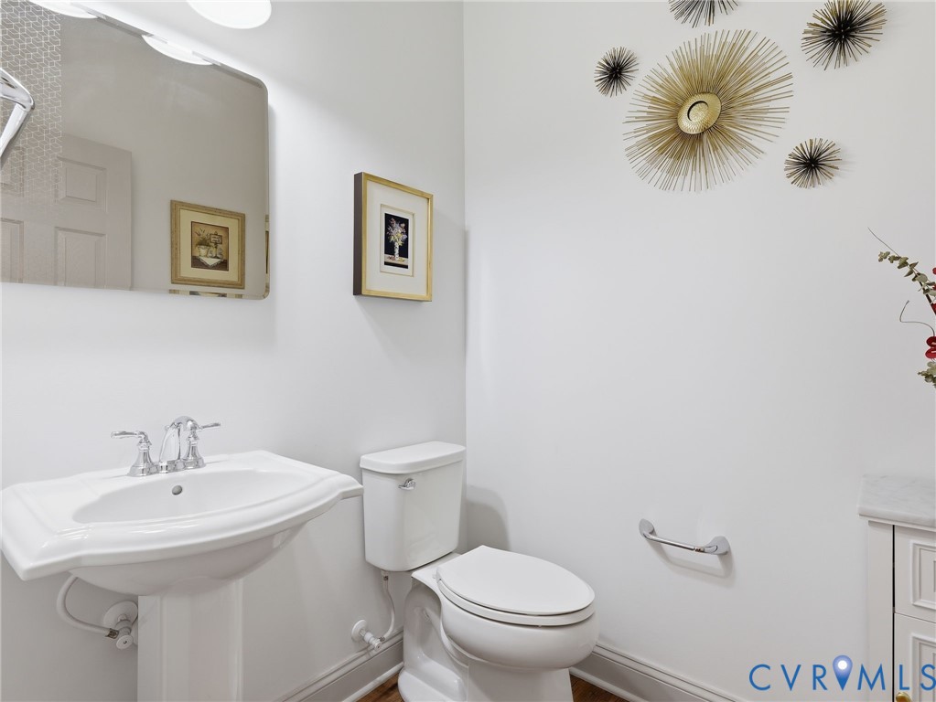 12520 Donahue Road Glen Allen, VA 23059 - Photo 29 of 35 a bathroom with a sink mirror and toilet
