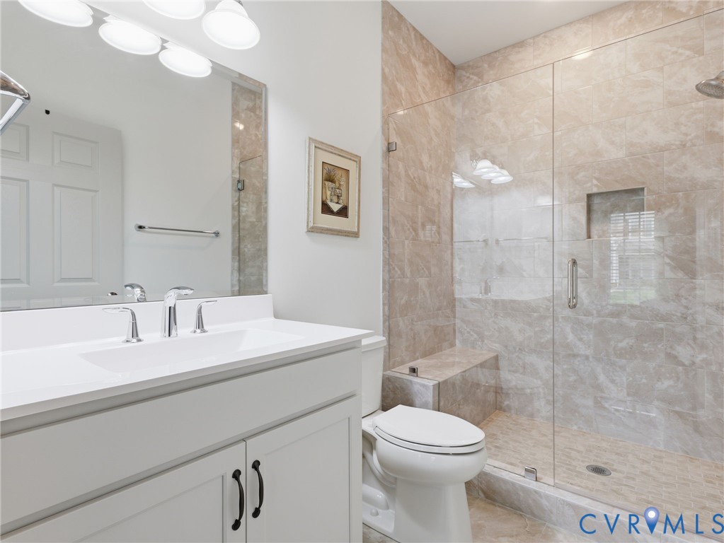 12520 Donahue Road Glen Allen, VA 23059 - Photo 30 of 35 a bathroom with a sink a toilet and shower