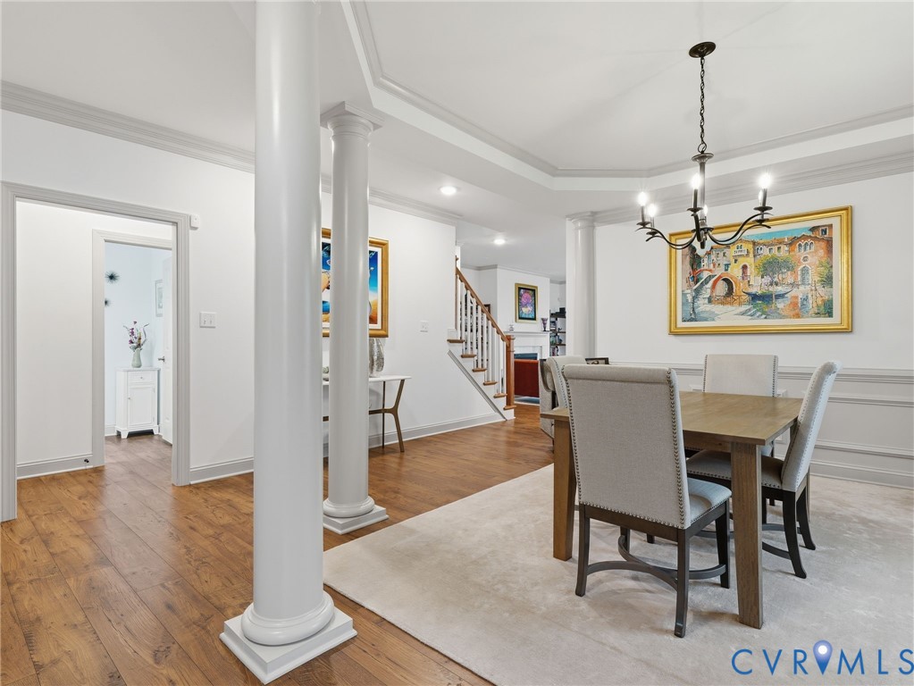 12520 Donahue Road Glen Allen, VA 23059 - Photo 4 of 35 a view of a dining room with furniture wooden floor and chandelier
