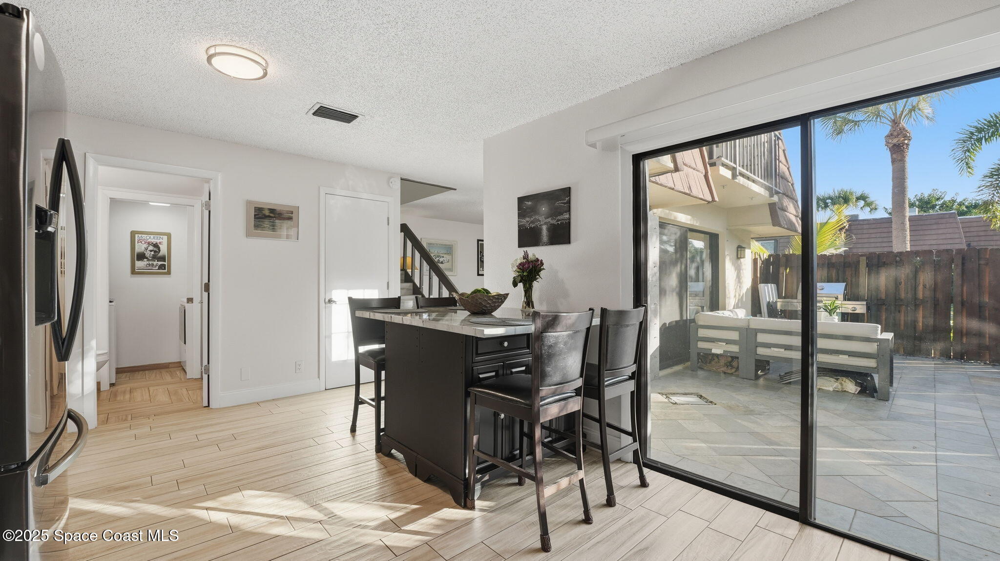 1511 Erin Court Palm Bay, FL 32905 - Photo 12 of 32 a view of a dining room with furniture window and outside view