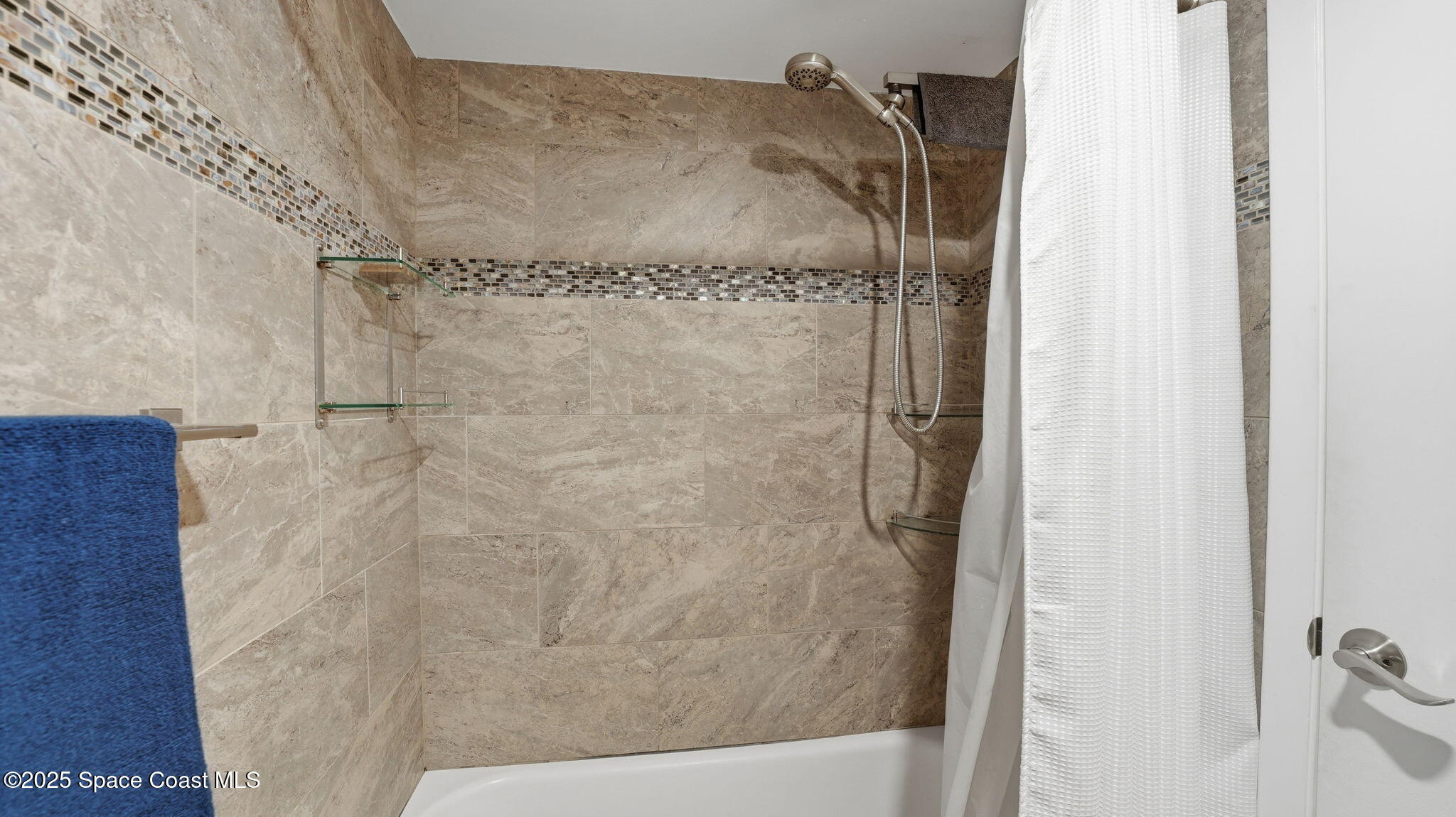 1511 Erin Court Palm Bay, FL 32905 - Photo 26 of 32 a bathroom with a shower