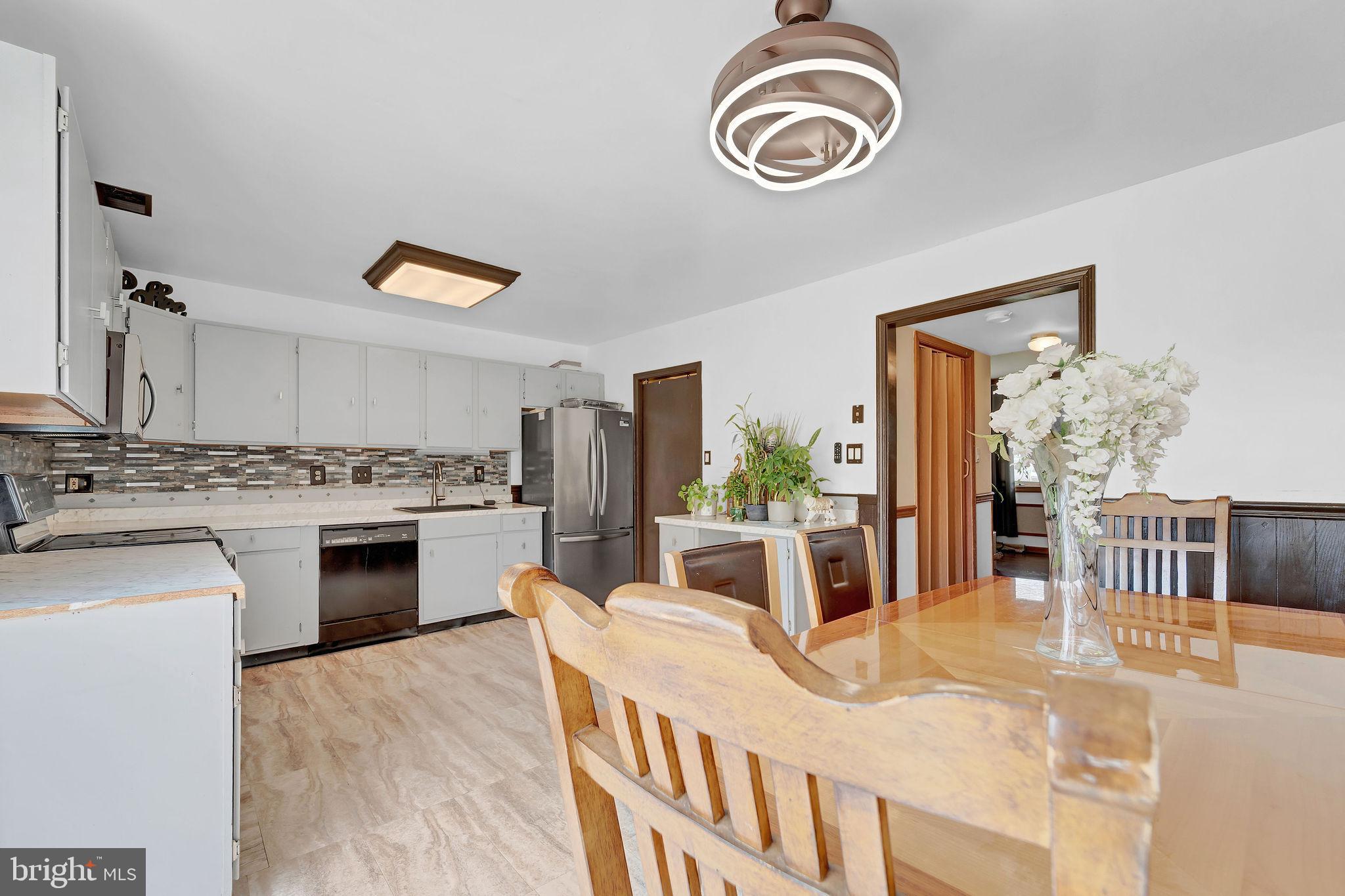 6 Transom Court Elkton, MD 21921 - Photo 15 of 33 a kitchen with a stove a sink and a refrigerator