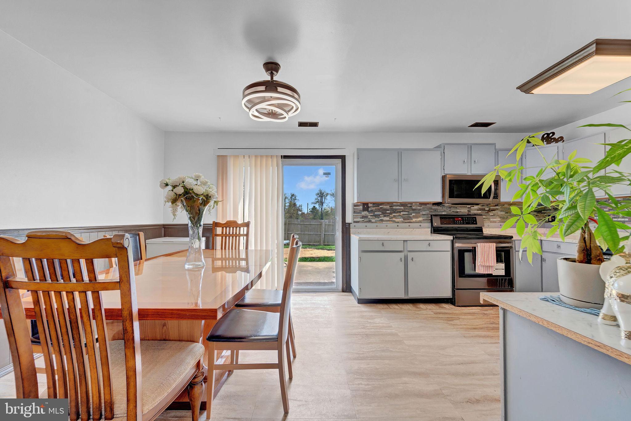 6 Transom Court Elkton, MD 21921 - Photo 16 of 33 a kitchen with a refrigerator and a stove top oven
