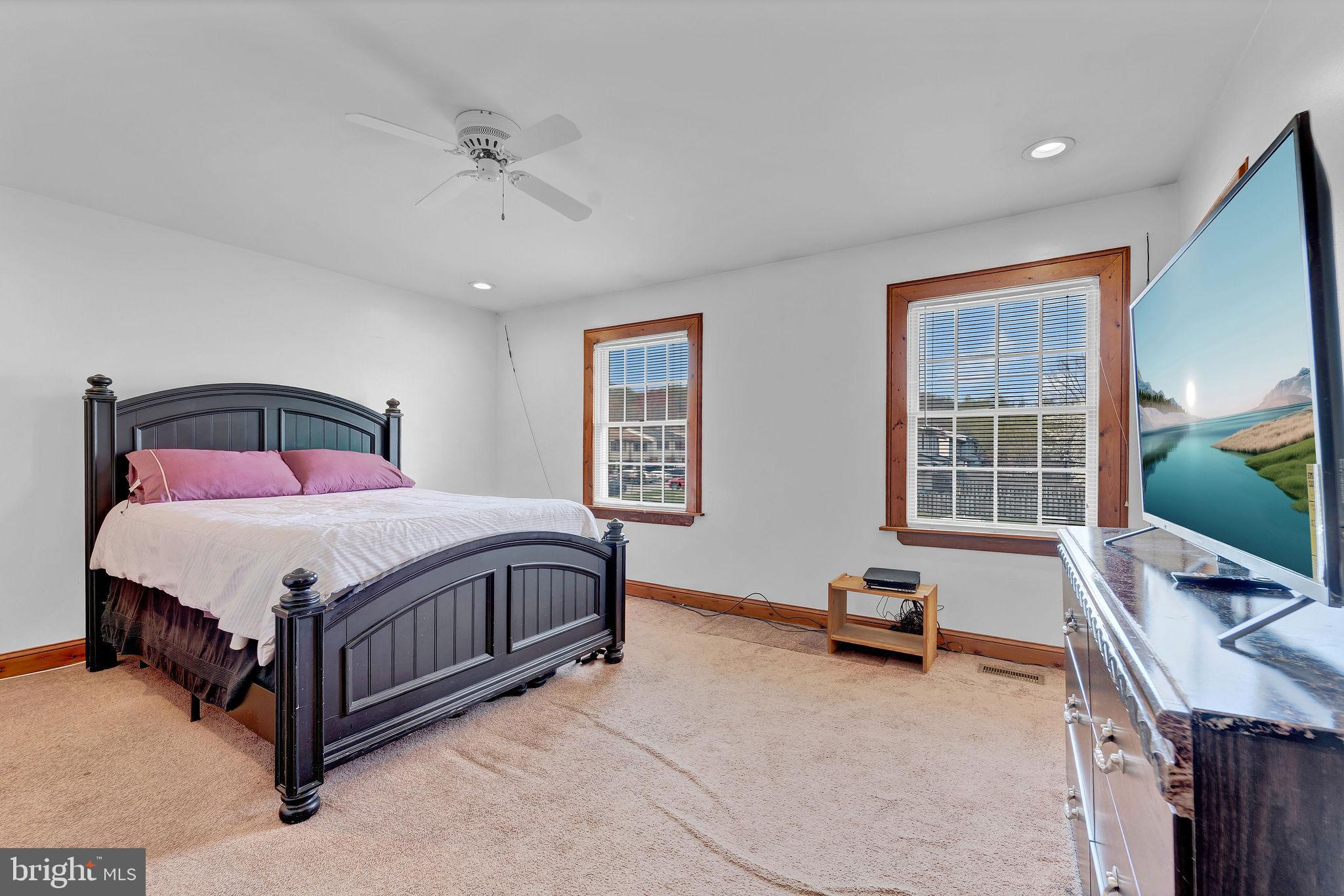 6 Transom Court Elkton, MD 21921 - Photo 18 of 33 a spacious bedroom with a bed and a window