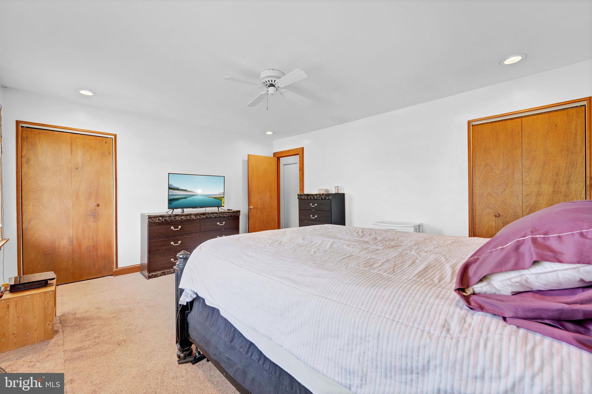 6 Transom Court Elkton, MD 21921 - Photo 19 of 33 a spacious bedroom with a bed and a dresser