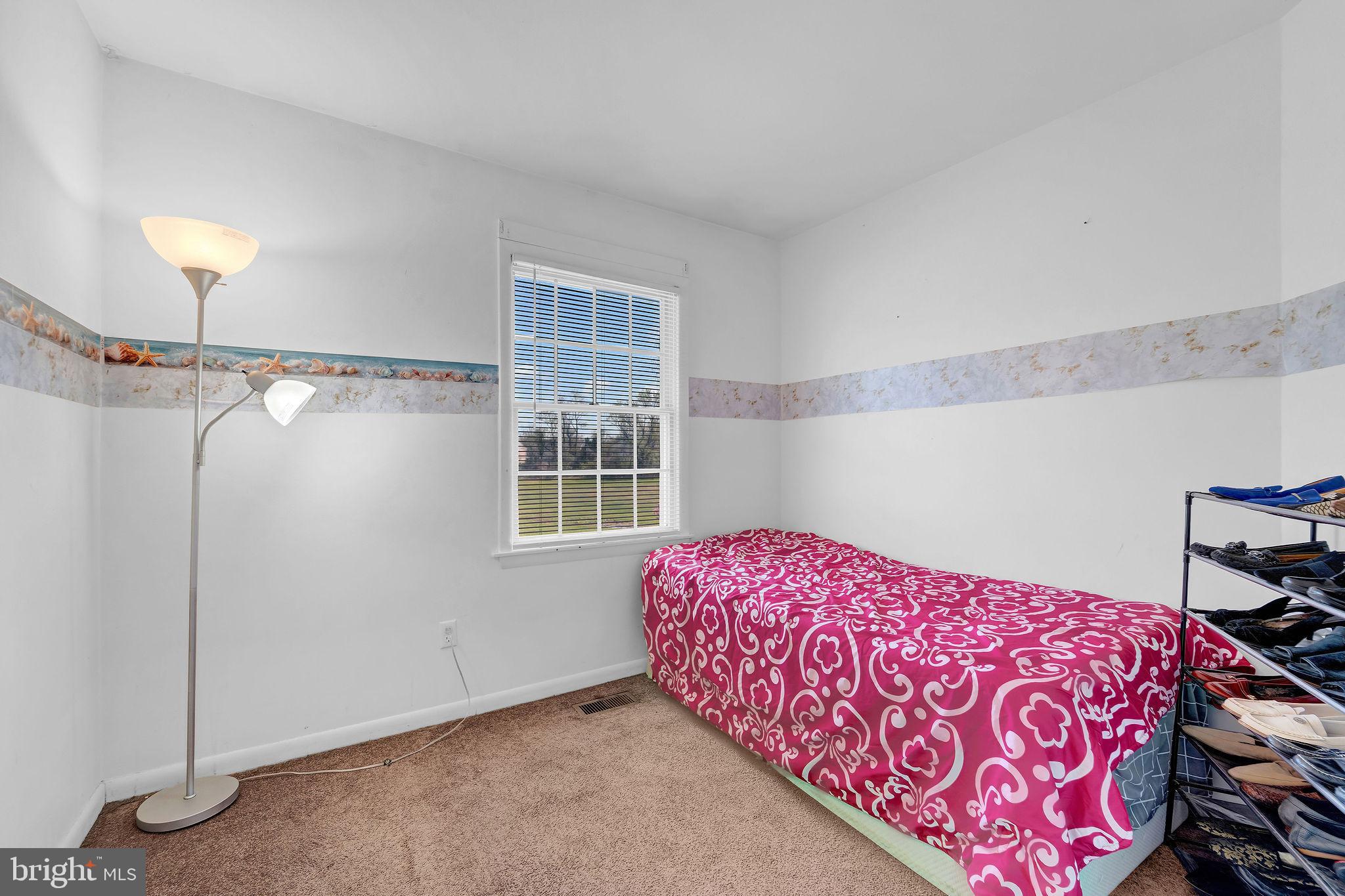 6 Transom Court Elkton, MD 21921 - Photo 23 of 33 a bedroom with a bed and a window