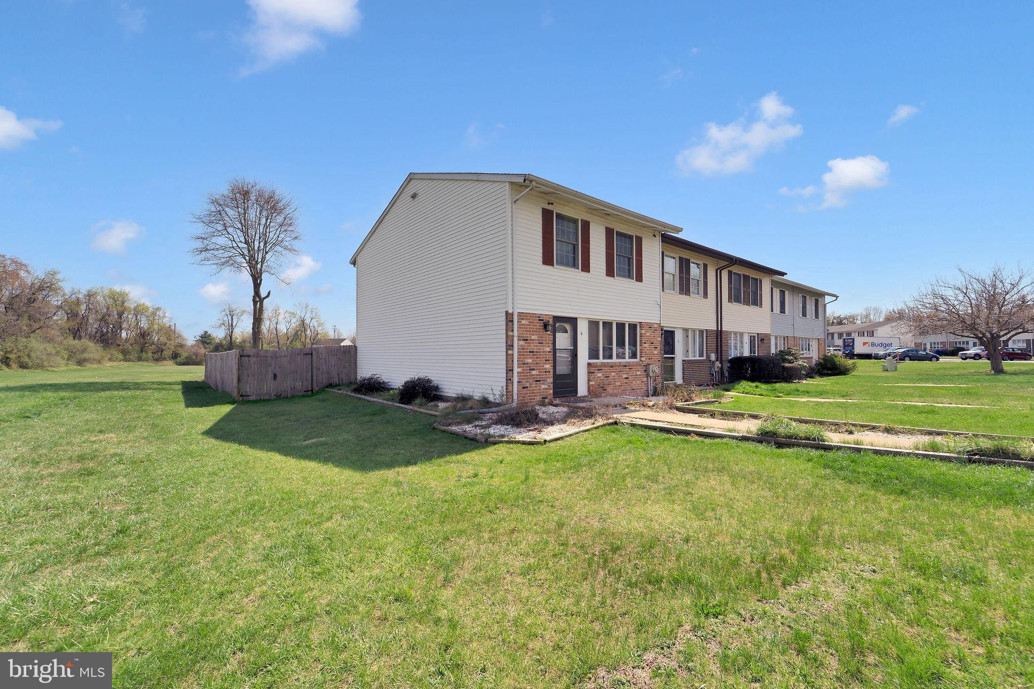 6 Transom Court Elkton, MD 21921 - Photo 3 of 33 a view of a house with a big yard and a large tree