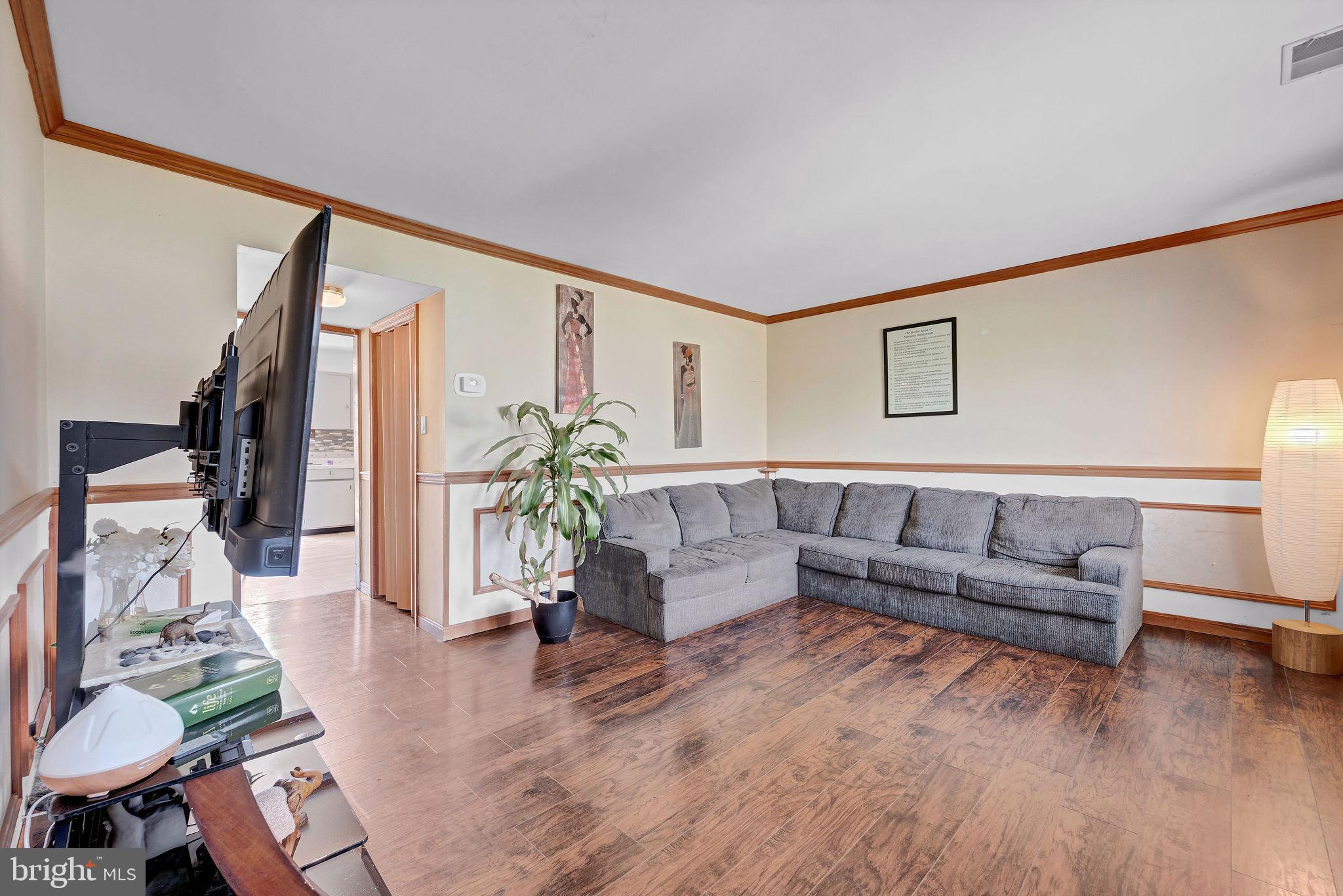 6 Transom Court Elkton, MD 21921 - Photo 5 of 33 a living room with furniture and a wooden floor