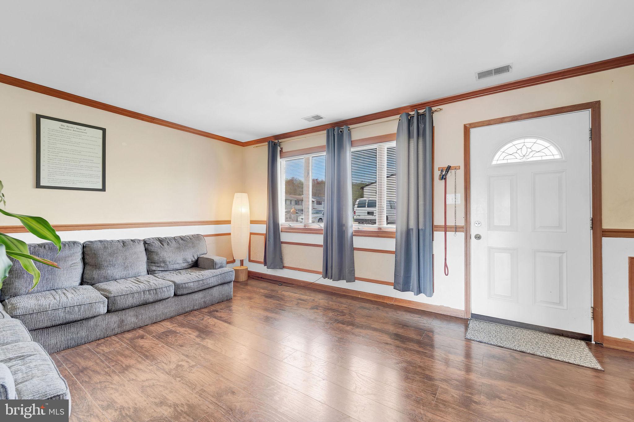 6 Transom Court Elkton, MD 21921 - Photo 6 of 33 a living room with furniture and a large window