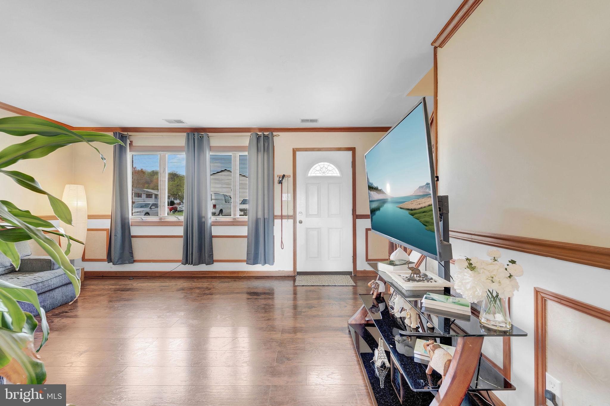 6 Transom Court Elkton, MD 21921 - Photo 7 of 33 a view of a livingroom with furniture and hardwood floor