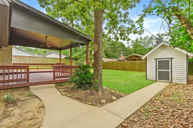 a view of a backyard with garden