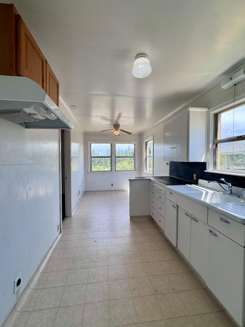 240 Pleasant Street Colfax, CA 95713 - Photo 9 of 26 a large kitchen with kitchen island a sink stainless steel appliances and cabinets
