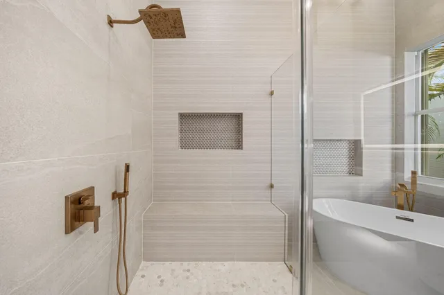 a spacious bedroom with a bed and a window