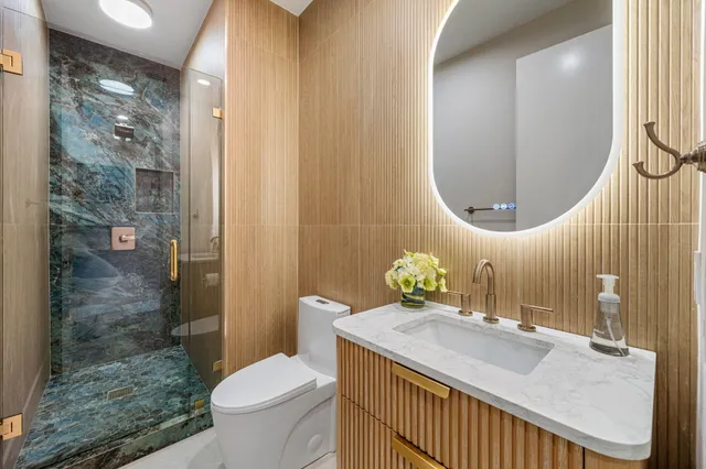 a spacious bedroom with a bed and a window