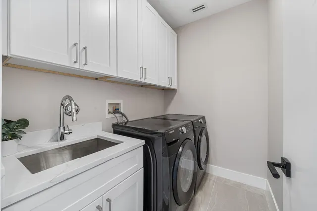 a view of a backyard with a patio