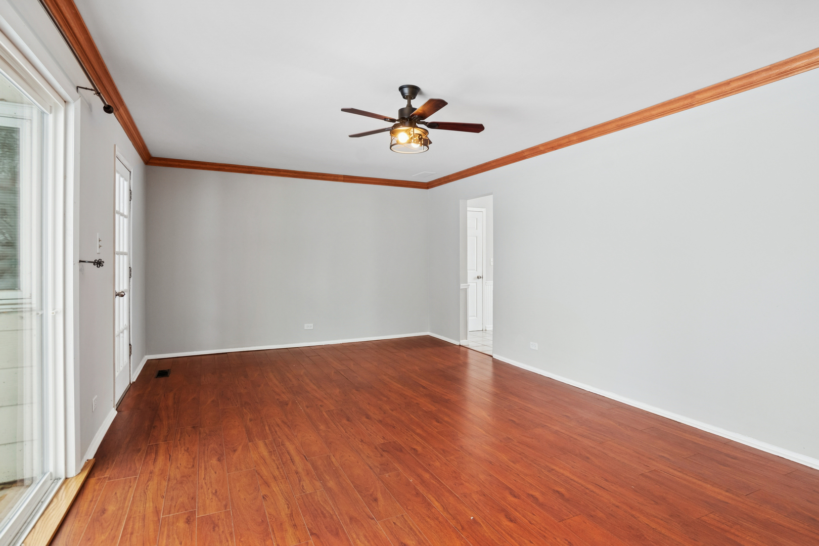 1902 North Washington Street Wheaton, IL 60187 - Photo 2 of 21 a view of empty room with wooden floor