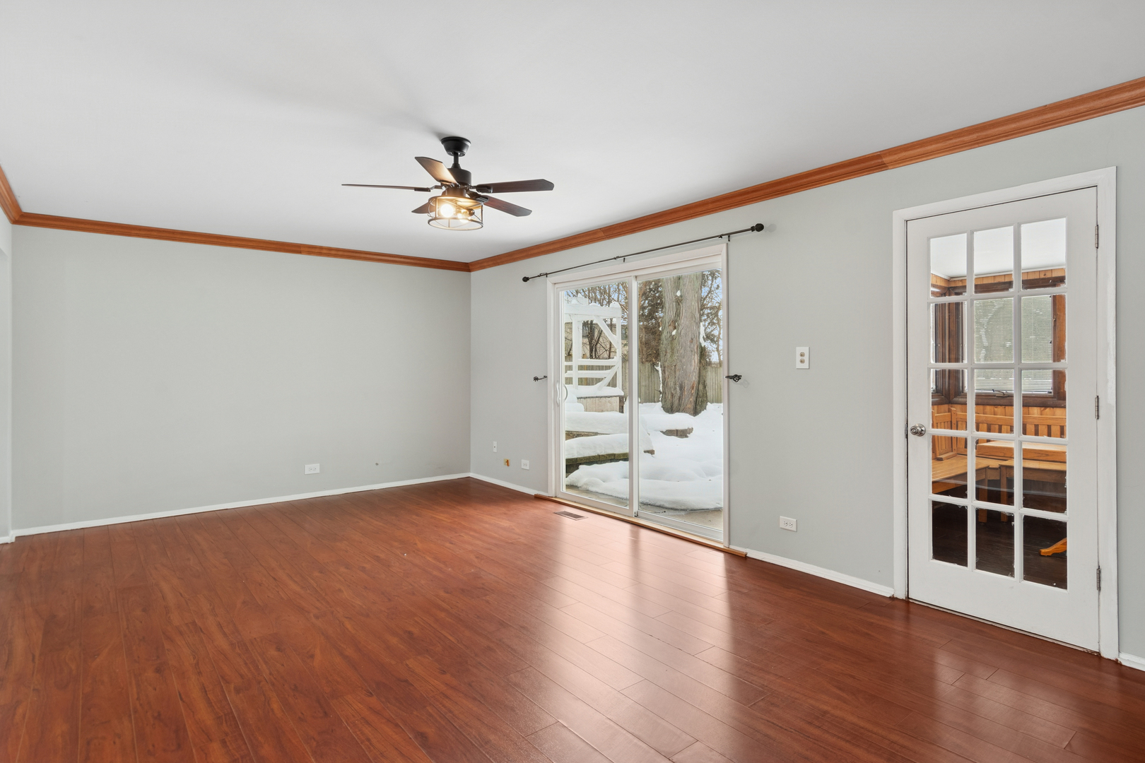 1902 North Washington Street Wheaton, IL 60187 - Photo 8 of 21 wooden floor in an empty room with a window