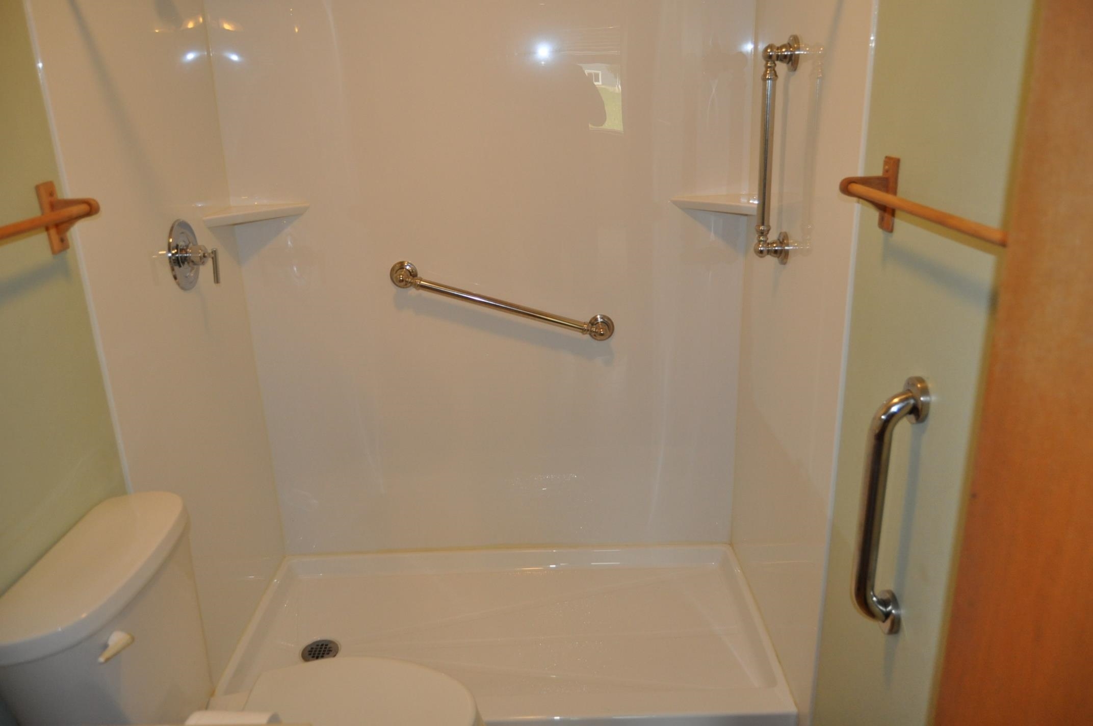 135 Fieldcrest Lane Cedarville, IL 61013 - Photo 11 of 45 a bathroom with a shower and toilet
