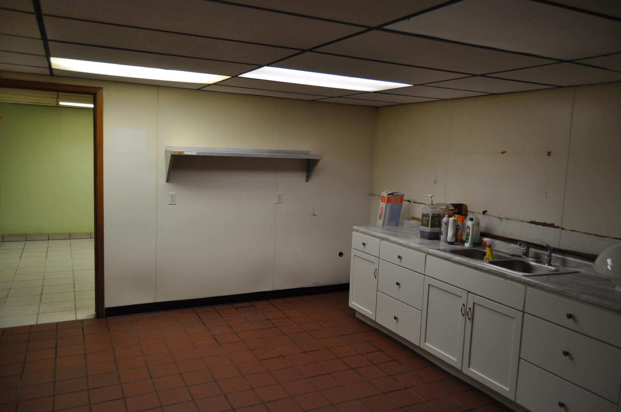 135 Fieldcrest Lane Cedarville, IL 61013 - Photo 22 of 45 a kitchen with cabinets and white appliances