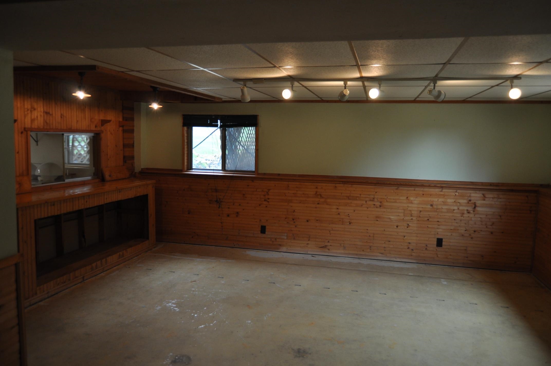 135 Fieldcrest Lane Cedarville, IL 61013 - Photo 24 of 45 a view of an empty room with a fireplace