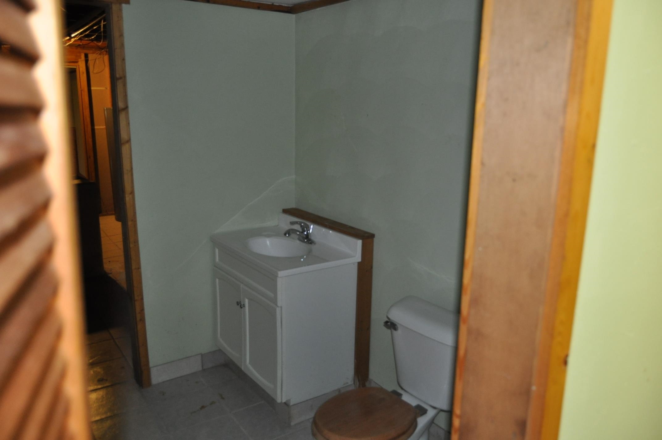 135 Fieldcrest Lane Cedarville, IL 61013 - Photo 30 of 45 a bathroom with a sink and a vanity