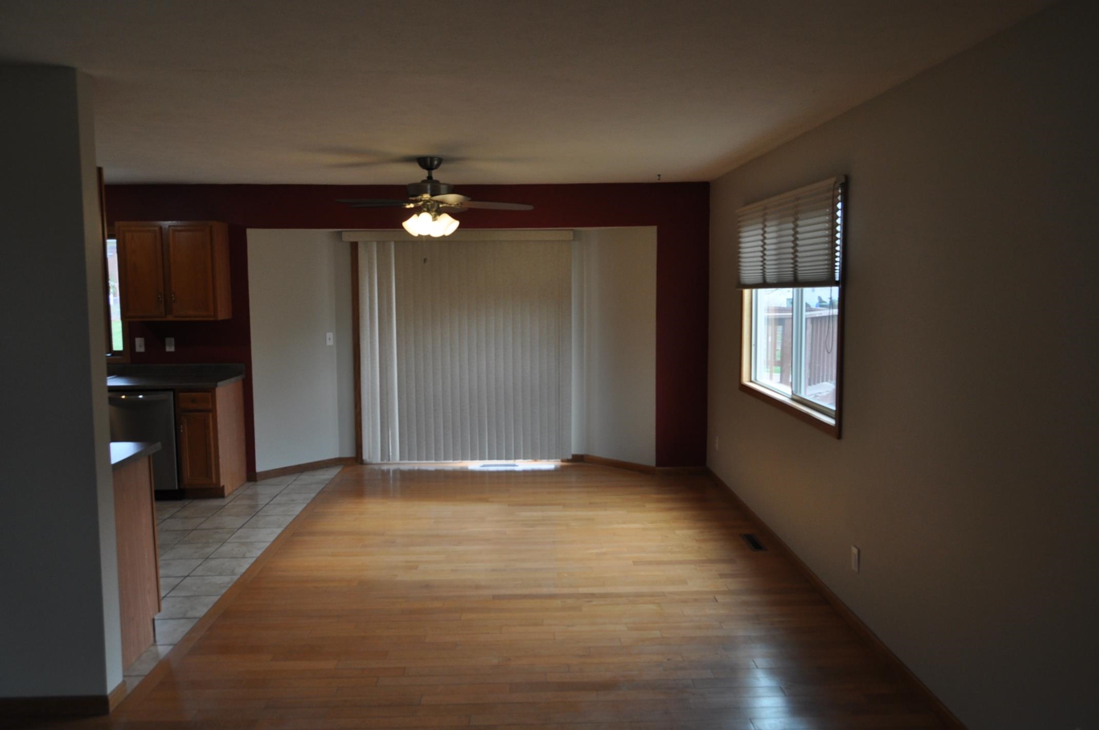 135 Fieldcrest Lane Cedarville, IL 61013 - Photo 3 of 45 wooden floor in an empty room with a window