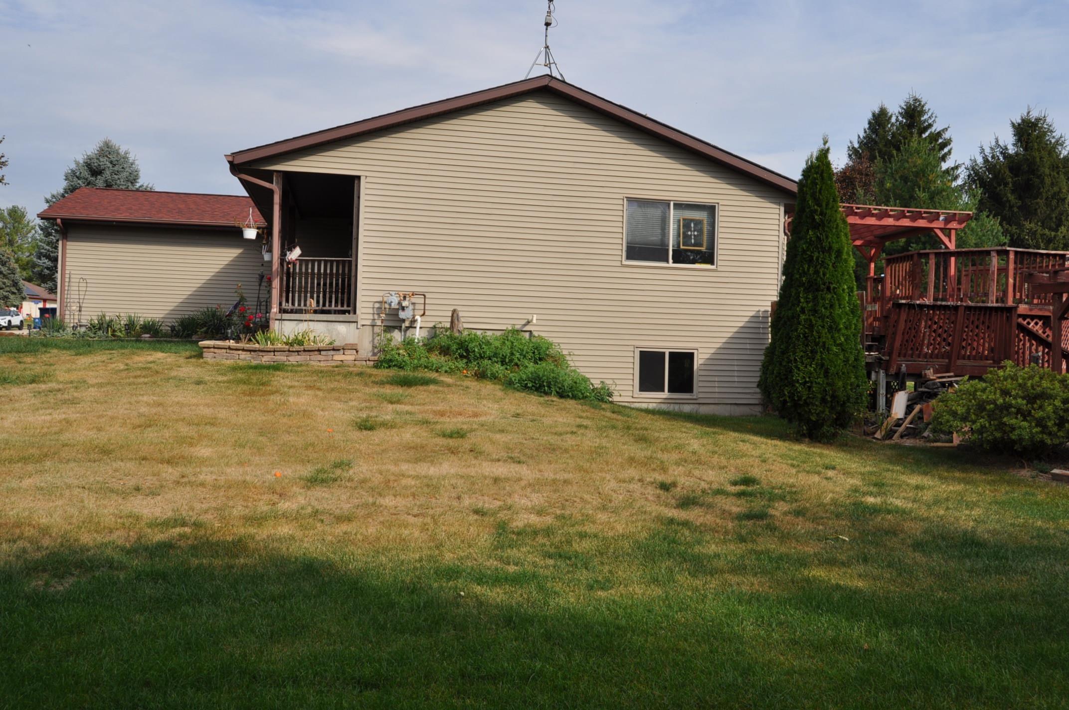 135 Fieldcrest Lane Cedarville, IL 61013 - Photo 37 of 45 a view of a house with backyard and garden