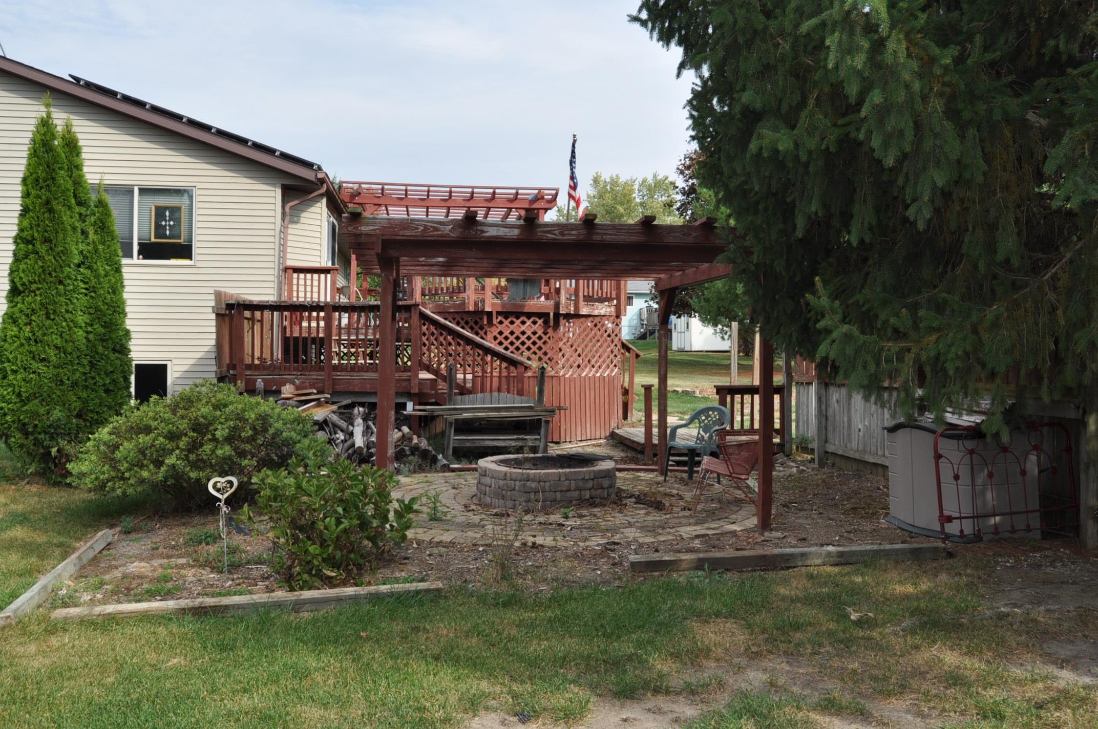 135 Fieldcrest Lane Cedarville, IL 61013 - Photo 38 of 45 a view of a house with a patio