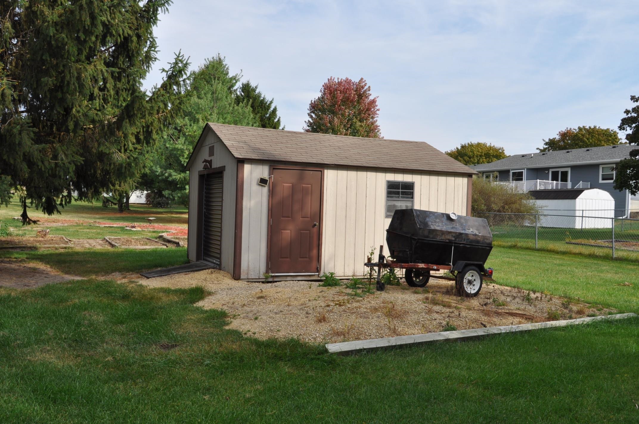 135 Fieldcrest Lane Cedarville, IL 61013 - Photo 39 of 45 a house view with a garden space